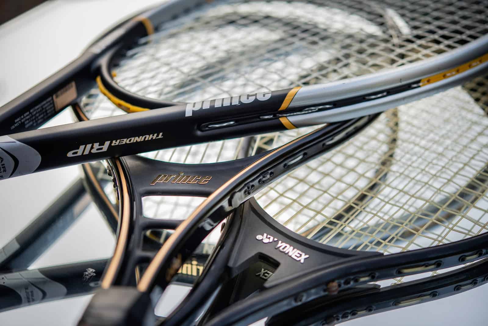 black and yellow tennis racket